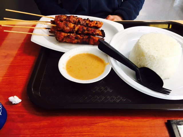 Sate ayam (pronounced sah-tay eye-ahm), or grilled chicken 
skewers marinated in a base of sweet soy sauce and onion, served 
with white rice and peanut sauce at Bali Sate House 