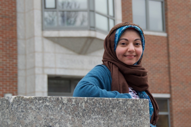 Yussra Ebrahim standing outside the campus where she studies.