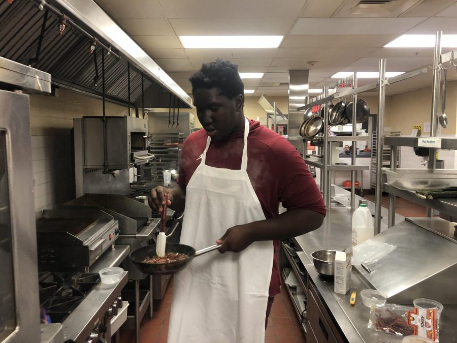 Tyrese Sterling testing out his recipe for this weeks Gourmet to go