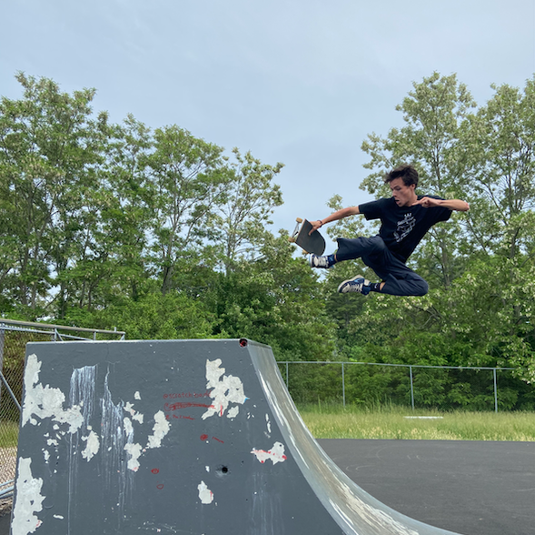 Seamus Durkin hitting a new trick at Greenleaf skatepark.