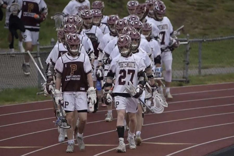 The+PHS+Boys+Lacrosse+team+walking+out+for+a+big+game.+