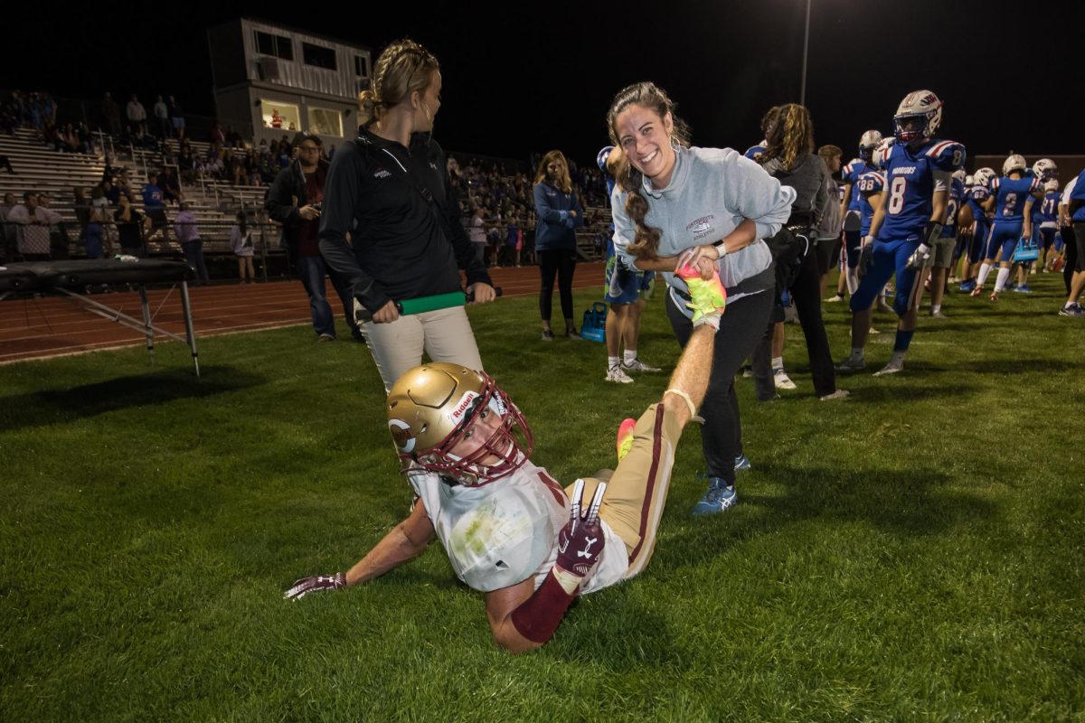 Shammara Al-Darraji is helping the ClipperCat athlete with leg cramps August, 23, 2025.